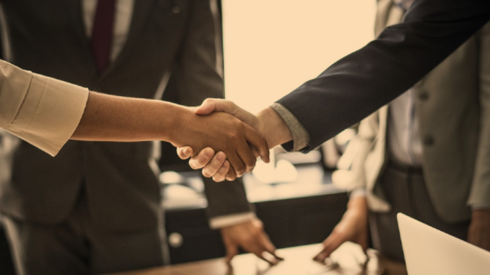 two people handshaking