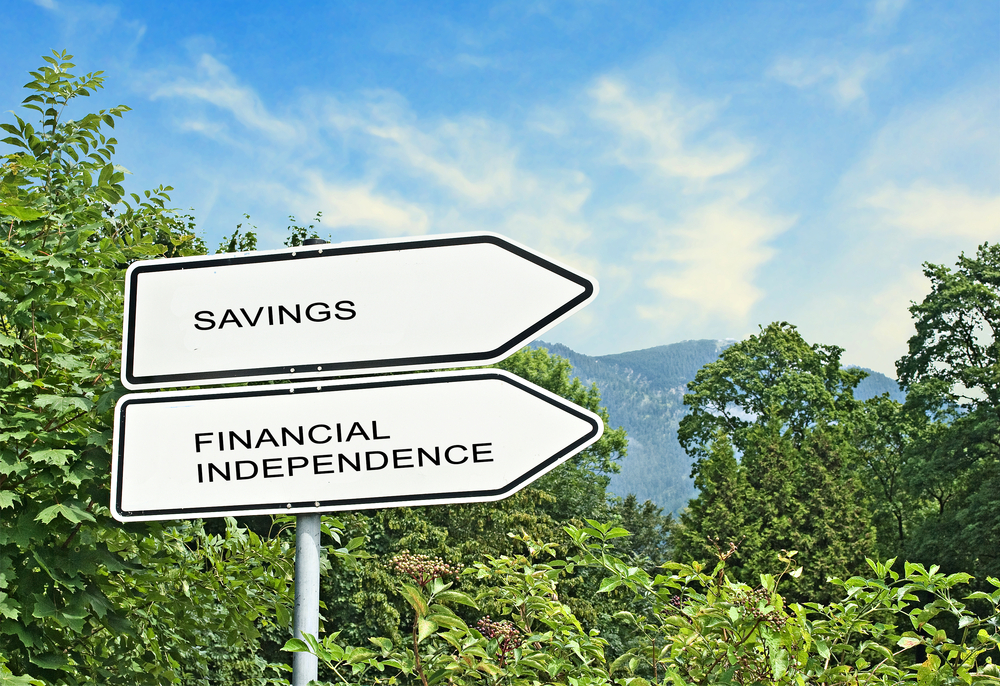 signs pointing to savings and financial independence outside