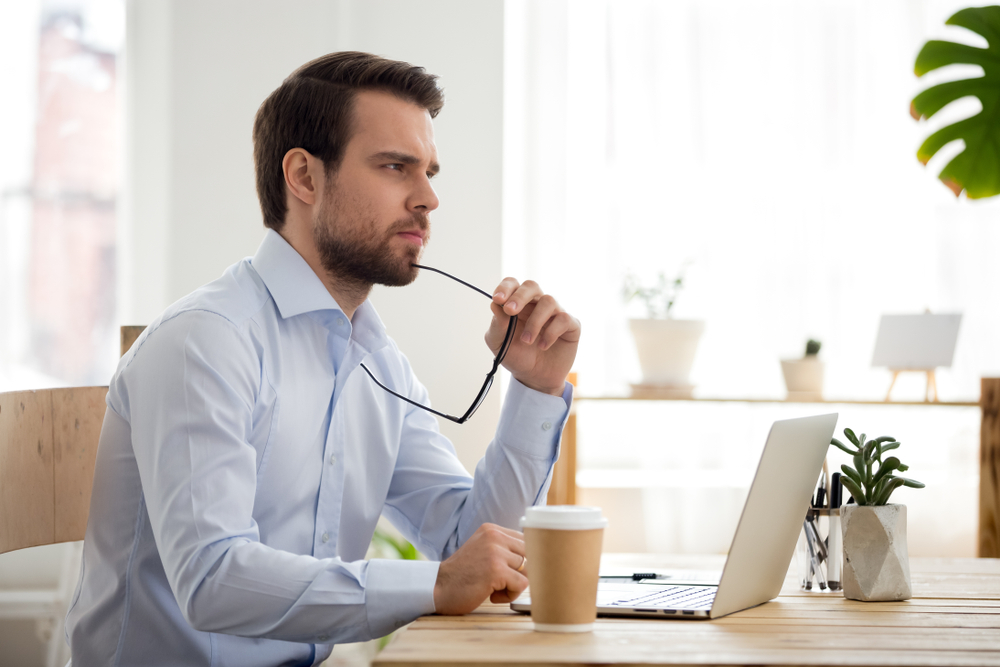 financial professional pondering a life insurance settlement