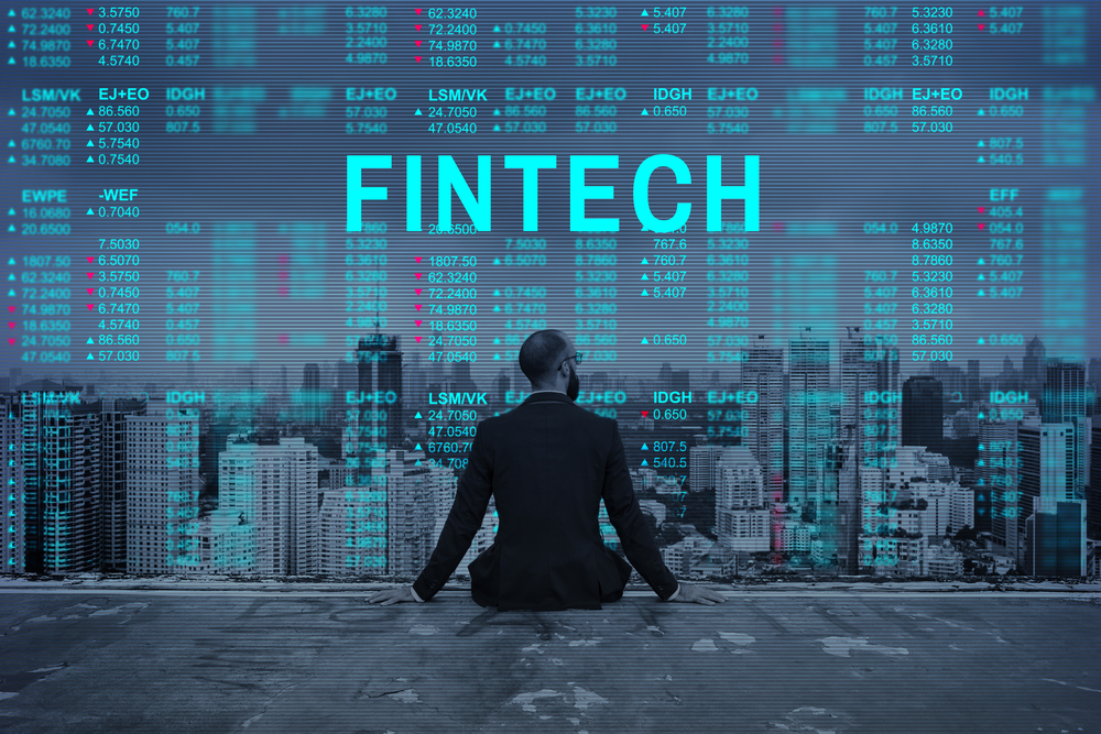 fintech image - man overlooking city 