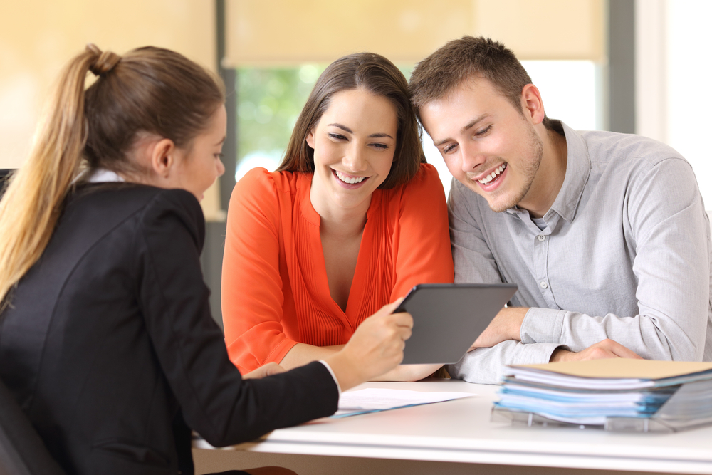 financial advisor meeting with her clients