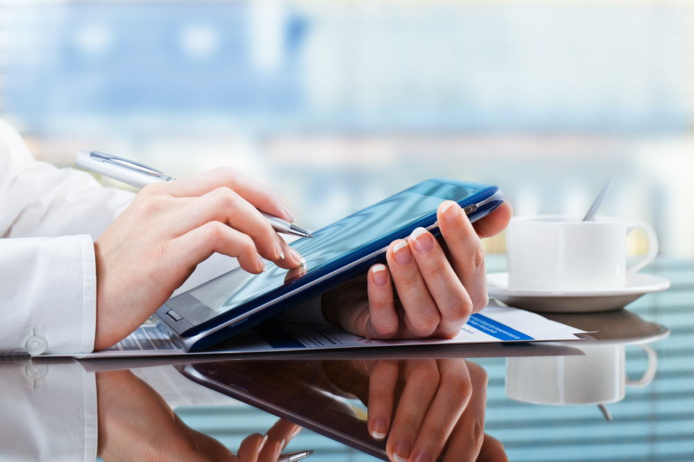 financial advisor using a tablet