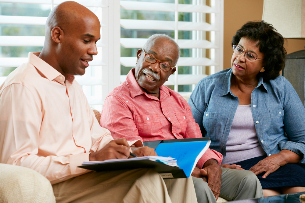 financial advisor explaining asset based long term care to clients